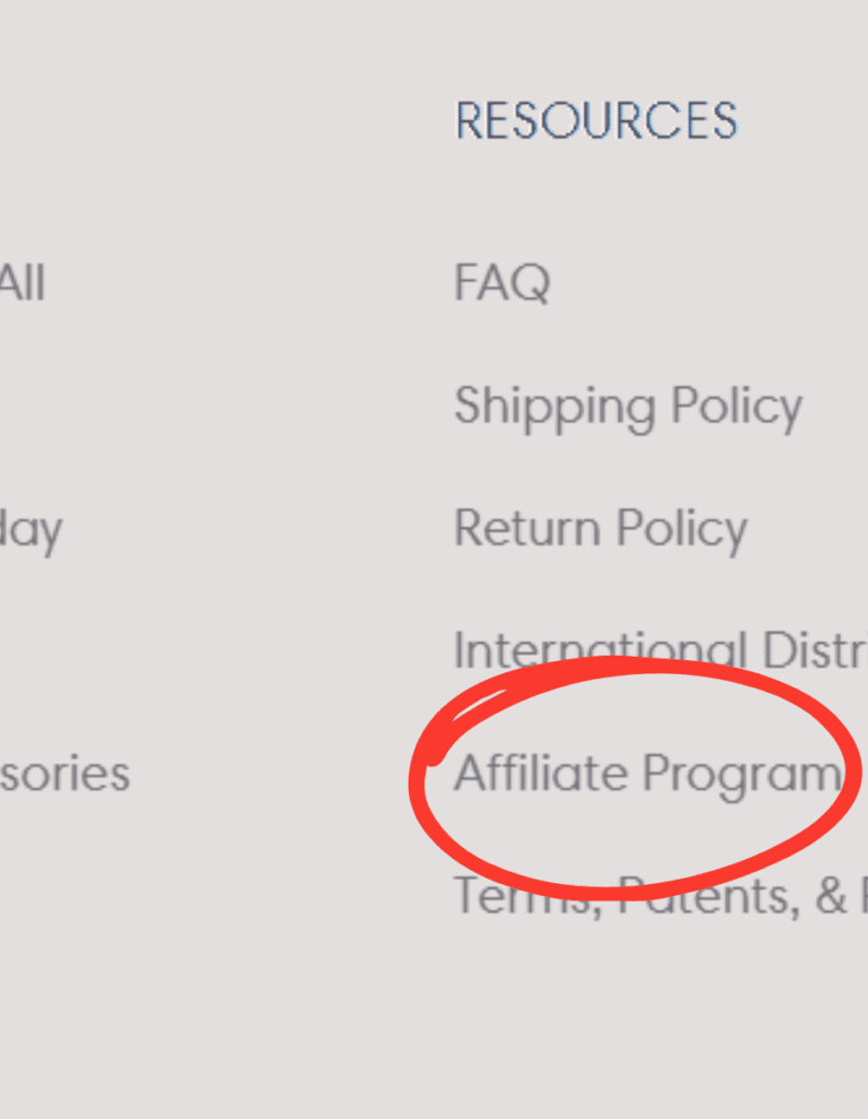 How to Start Affiliate Marketing for Beginners. image of a section of a footer of a website. It lists the differnt links, one being affiliate program. and affiliate program is circled in red to show where to look to find that link when you're trying to find affiliate programs