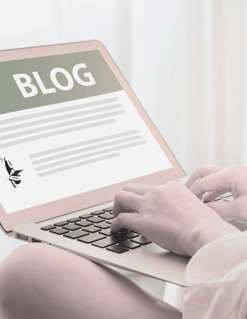 Should I start a blog or a marketing funnel. woman typing on a laptop and the word blog is on the screen