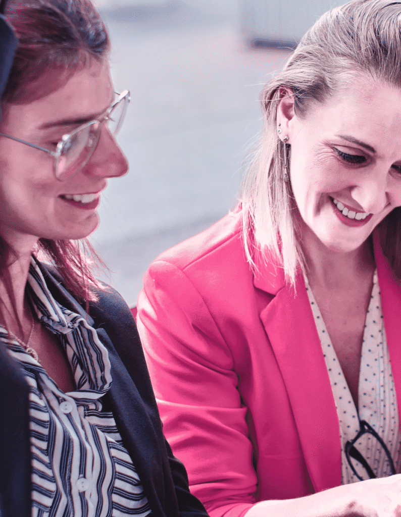 How to Start Affiliate Marketing for Beginners. two women smiling looking at something