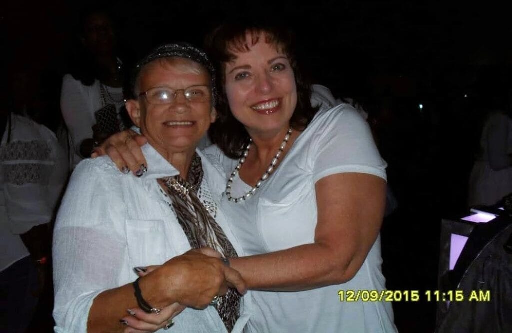 happy heavenly birthday mom. this is me and mom at a convention and the date on the photo is Dec. 2015. We're both smiling and having loads of fun.