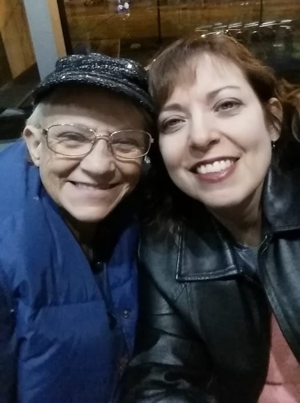 happy heavenly birthday mom. this is mom and me on one of our trips. we had coats on but smiling because we were having so much fun.