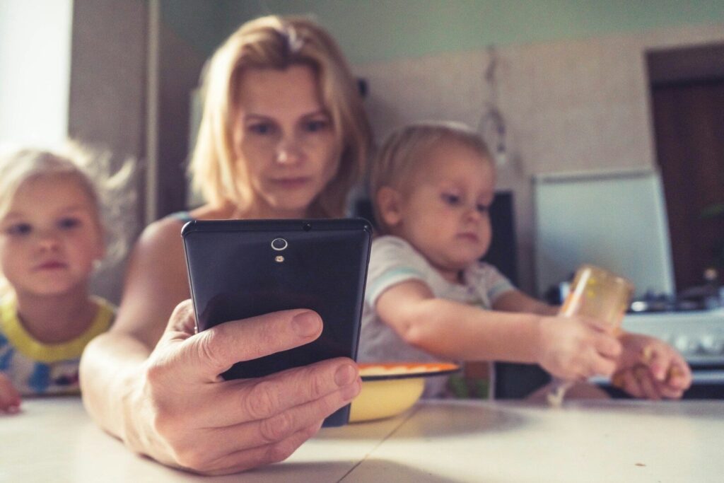 amazon influencer. woman in white shirt holding black ipad