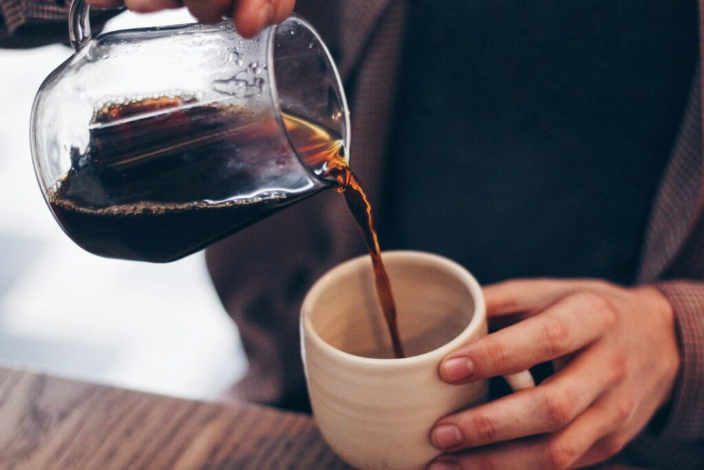faceless video ideas. person pouring coffee on mug