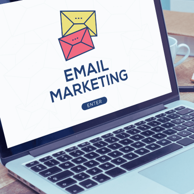 How to start an email list. image of a laptop with the words email marketing enter on the screen and two envelopes above it.