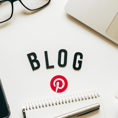 How to use pinterest for your blog. glasses, laptop and paper and pen on desk. the word blog in the middle and the pinterest logo below that.
