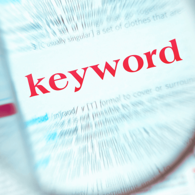 Pinterest kwyword tool. its a page in a book with writing blurred. But in the middle is the word Keyword in big red letters.